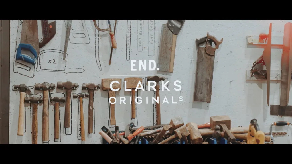 Hand tools arranged on a workshop wall for END x Clarks Originals