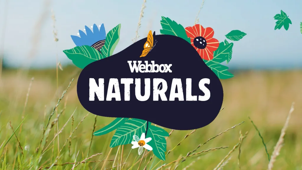 Webbox Naturals logo over a summer meadow
